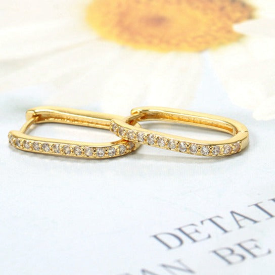 Pendientes en forma de U dorados Sirius