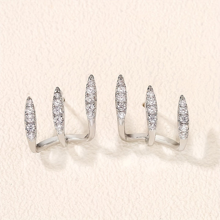 Pendientes de botón elegantes de strass con tres garras