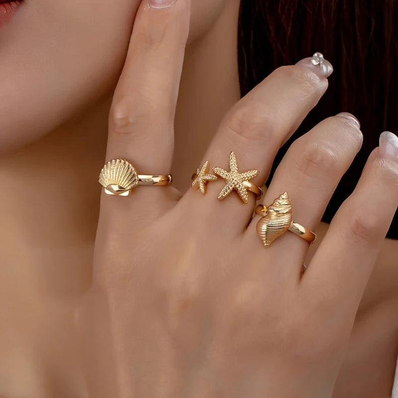 Conjunto de 3 Anillos Dorados Concha Estrella y Caracola