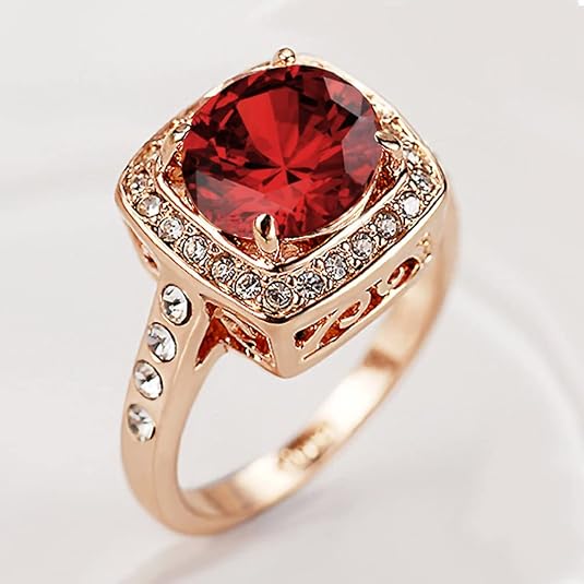 Anillo llamativo halo de rubí | Oro rosado