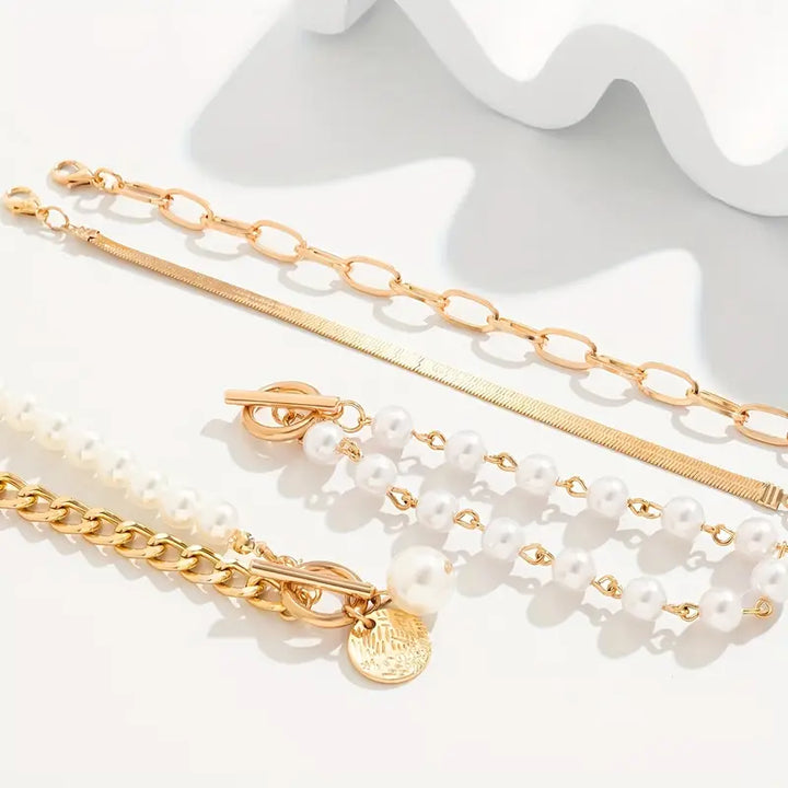 Set de Pulseras Chic Gold 4 Piezas - Serpiente, Perlas y Eslabones | Dorado