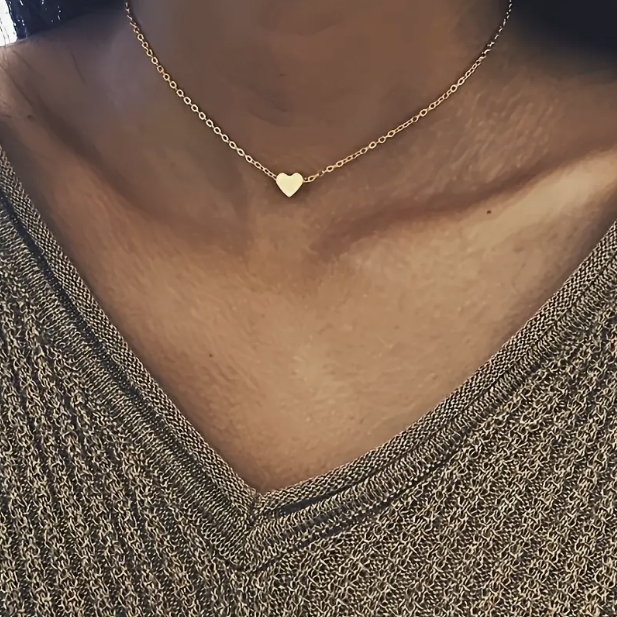 Colgante corazón de plata y oro con collar