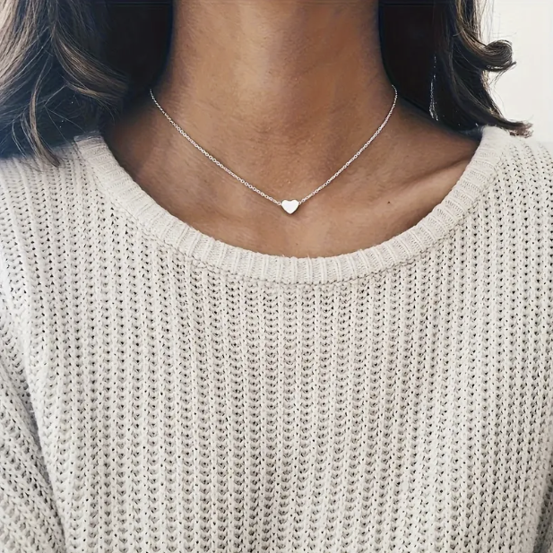 Colgante corazón de plata y oro con collar