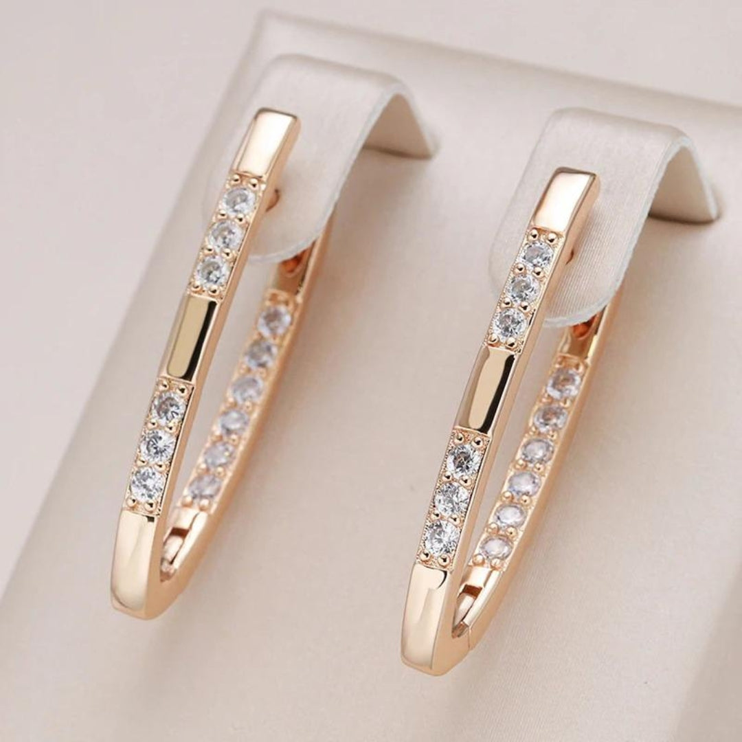 Pendientes elegantes de circonita en oro