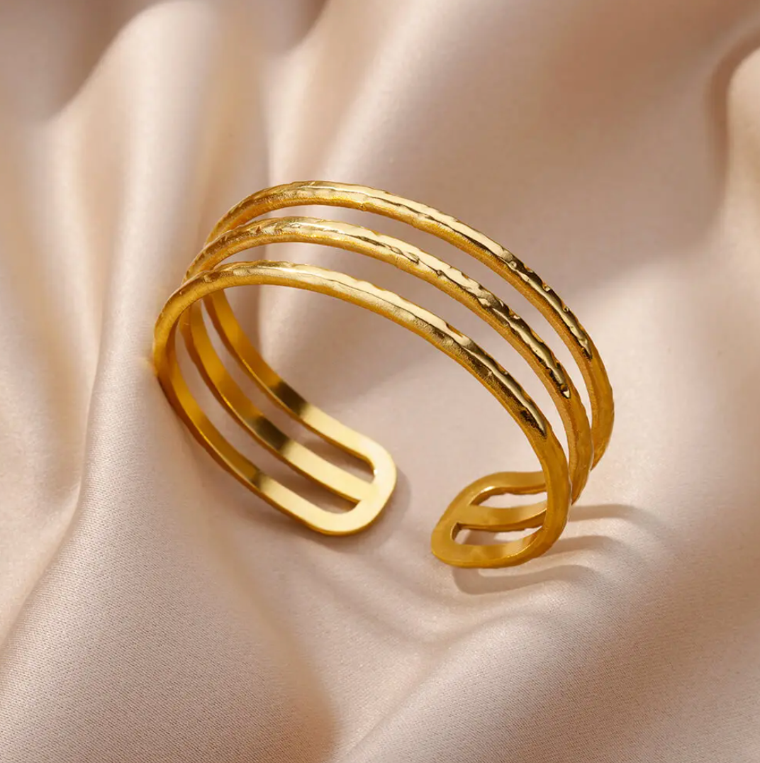 Pulsera chapada en oro de 18 quilates con 3 hilos abiertos