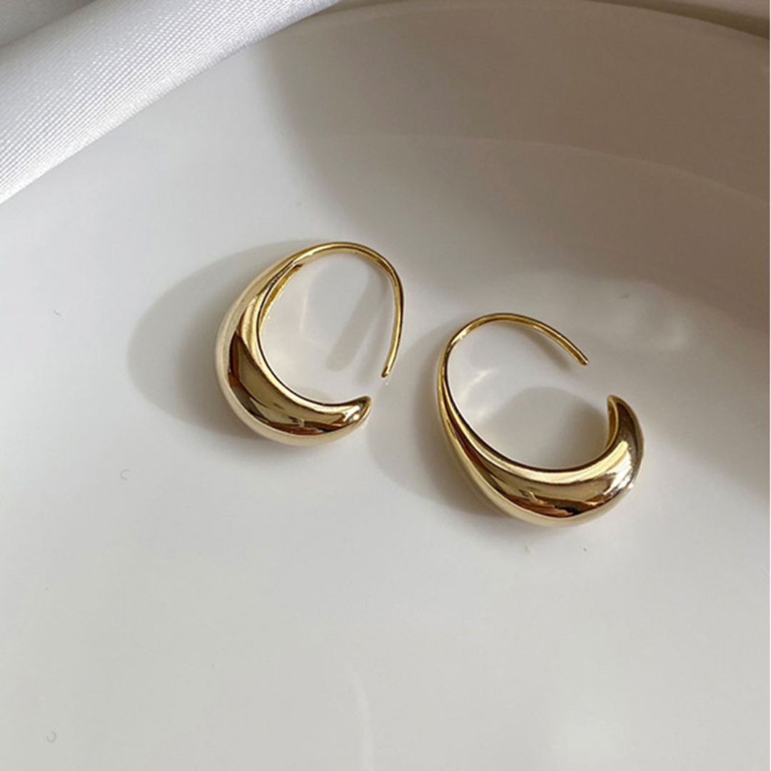 Pendientes modernistas dorados de 18 quilates brillantes