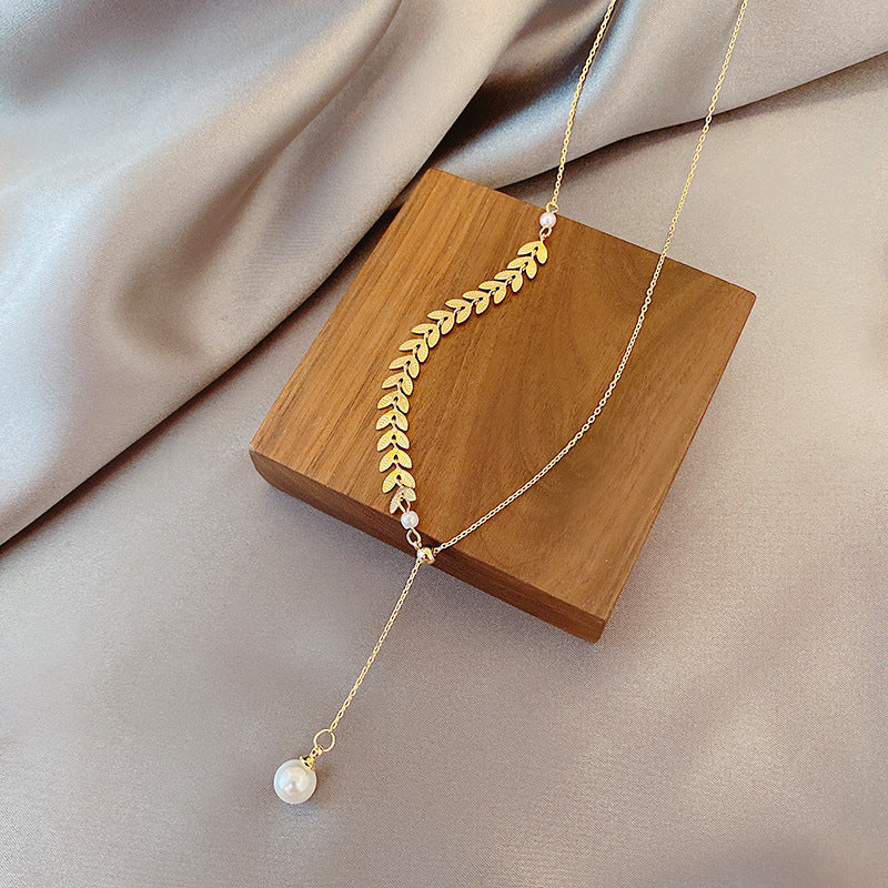 Collar de perlas de la Tranquilidad Dorada