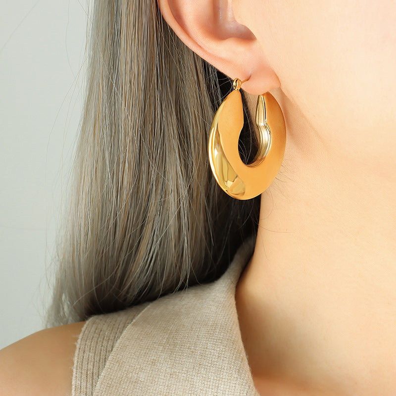 Pendientes de aro dorado Sol