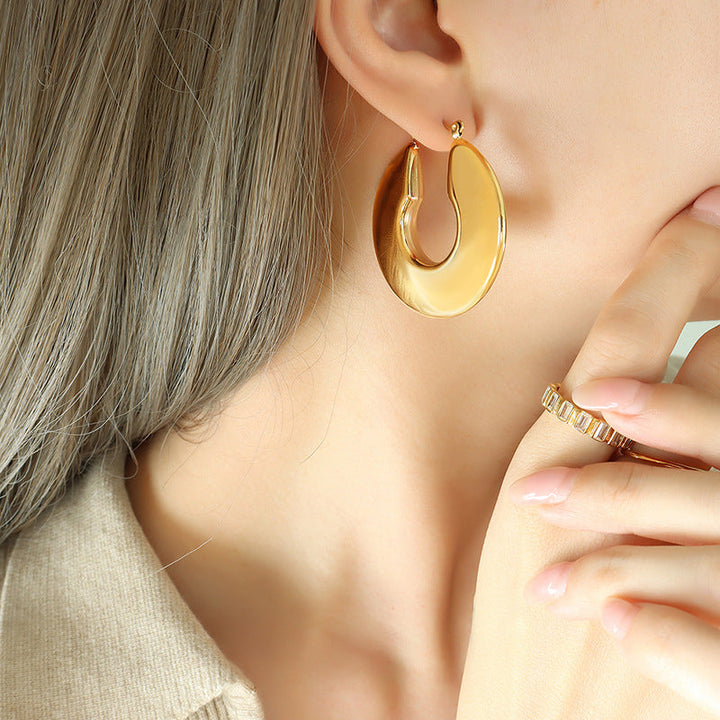 Pendientes de aro dorado Sol