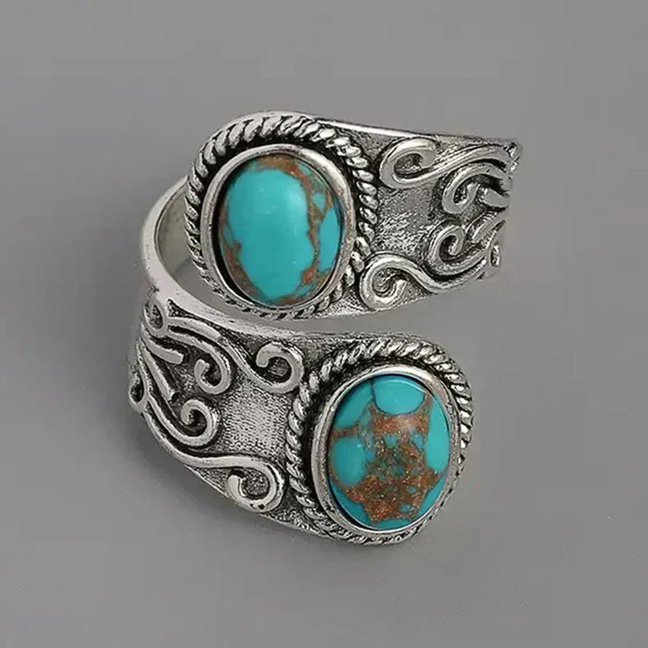 Elegante Anillo Vintage Cruzado de Turquesa