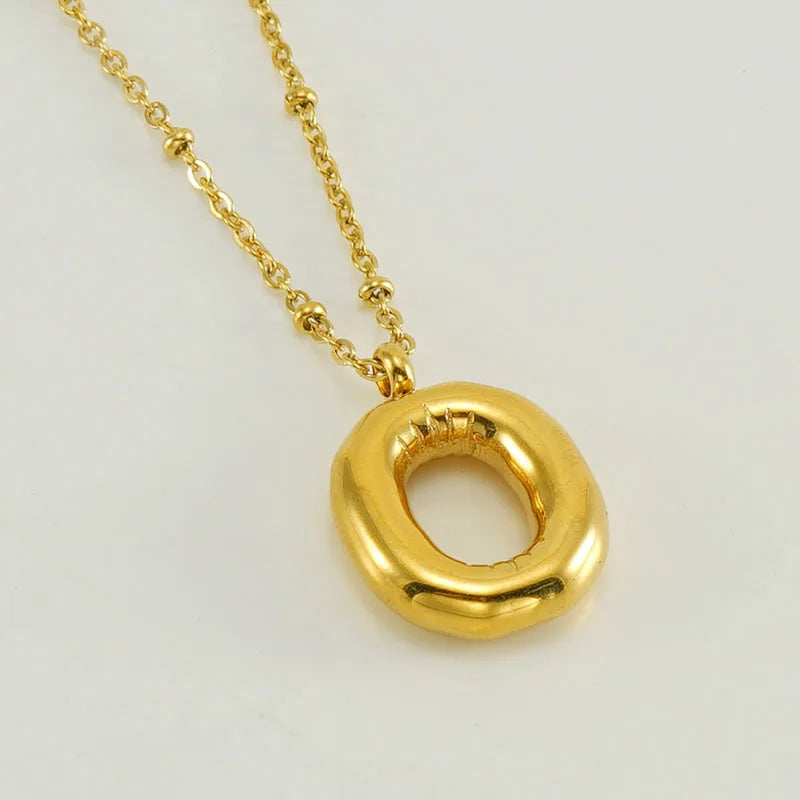 Collar especial de luz dorado de 18 quilates con esfera especial y letra inicial