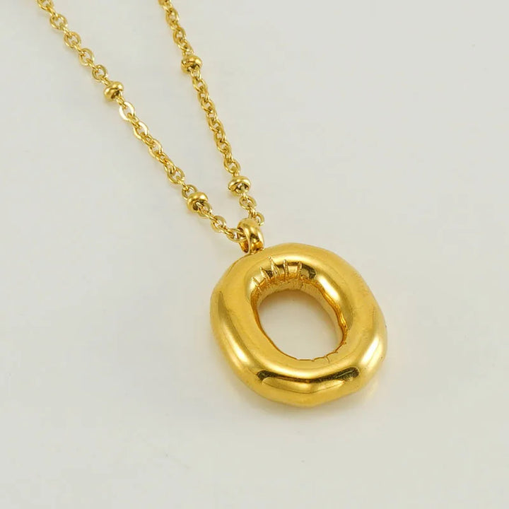 Collar especial de luz dorado de 18 quilates con esfera especial y letra inicial