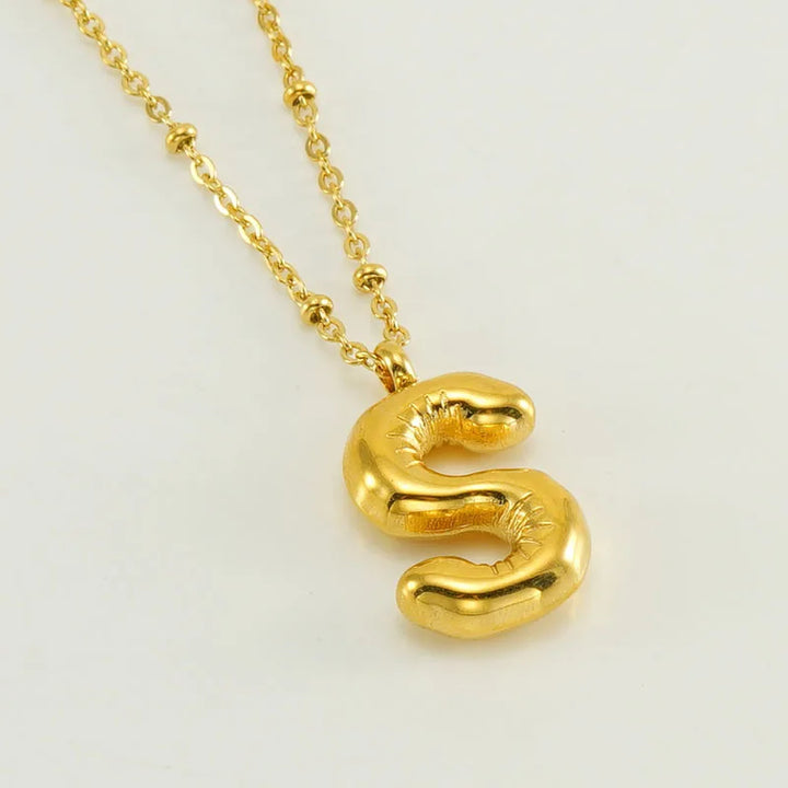 Collar especial de luz dorado de 18 quilates con esfera especial y letra inicial
