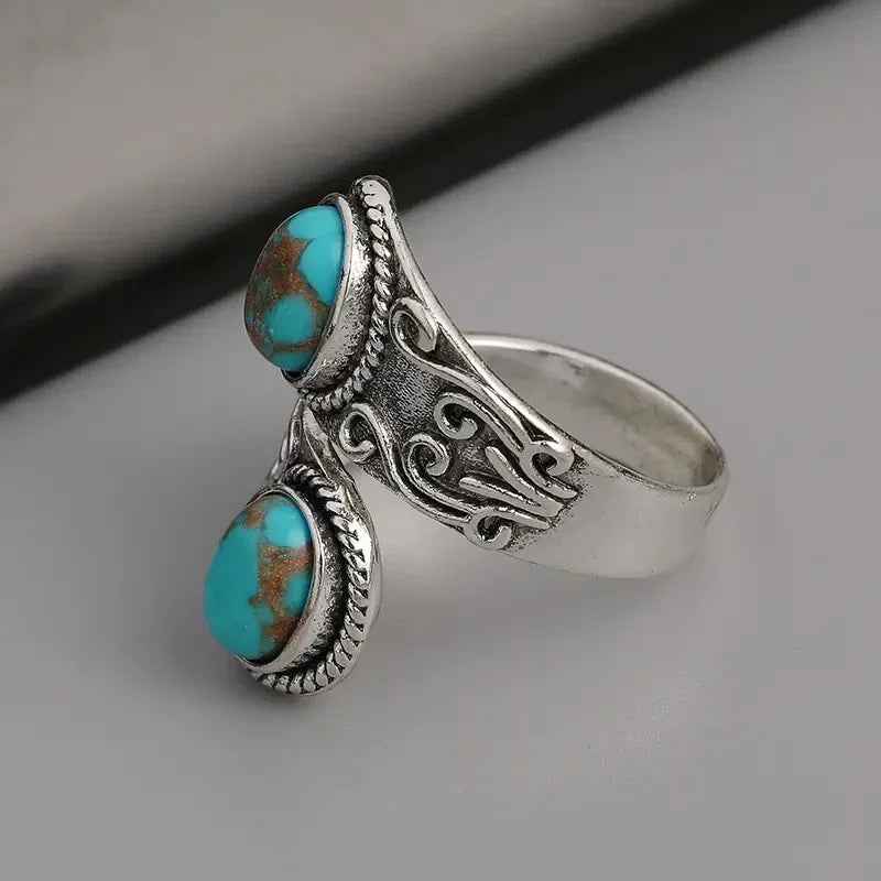 Elegante Anillo Vintage Cruzado de Turquesa