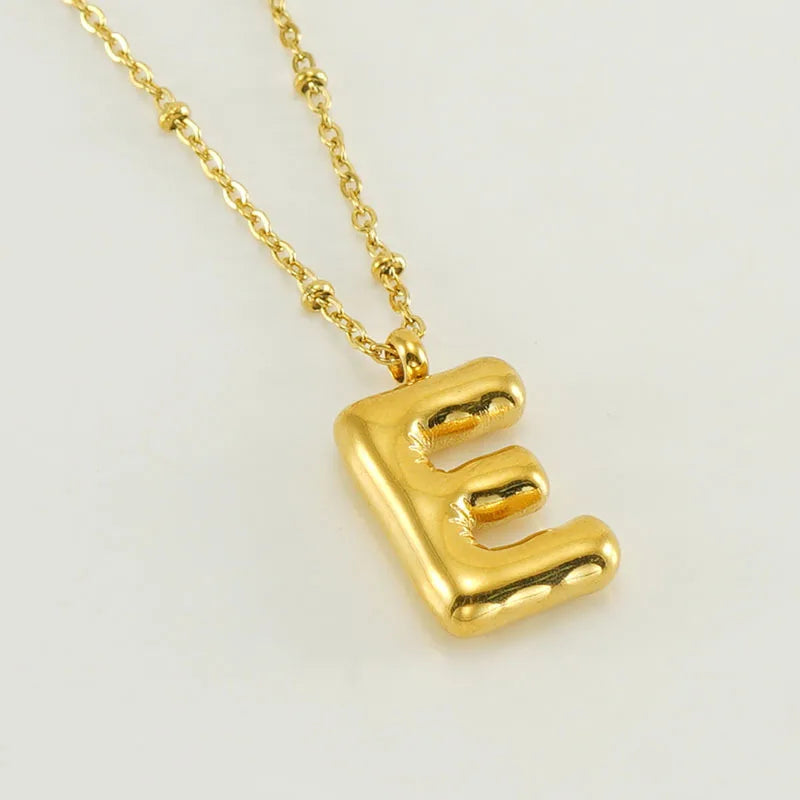 Collar especial de luz dorado de 18 quilates con esfera especial y letra inicial