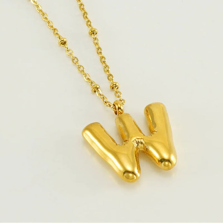 Collar especial de luz dorado de 18 quilates con esfera especial y letra inicial