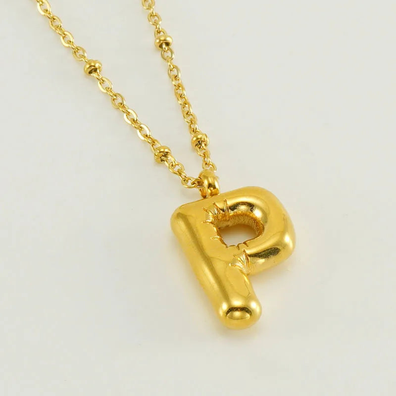 Collar especial de luz dorado de 18 quilates con esfera especial y letra inicial