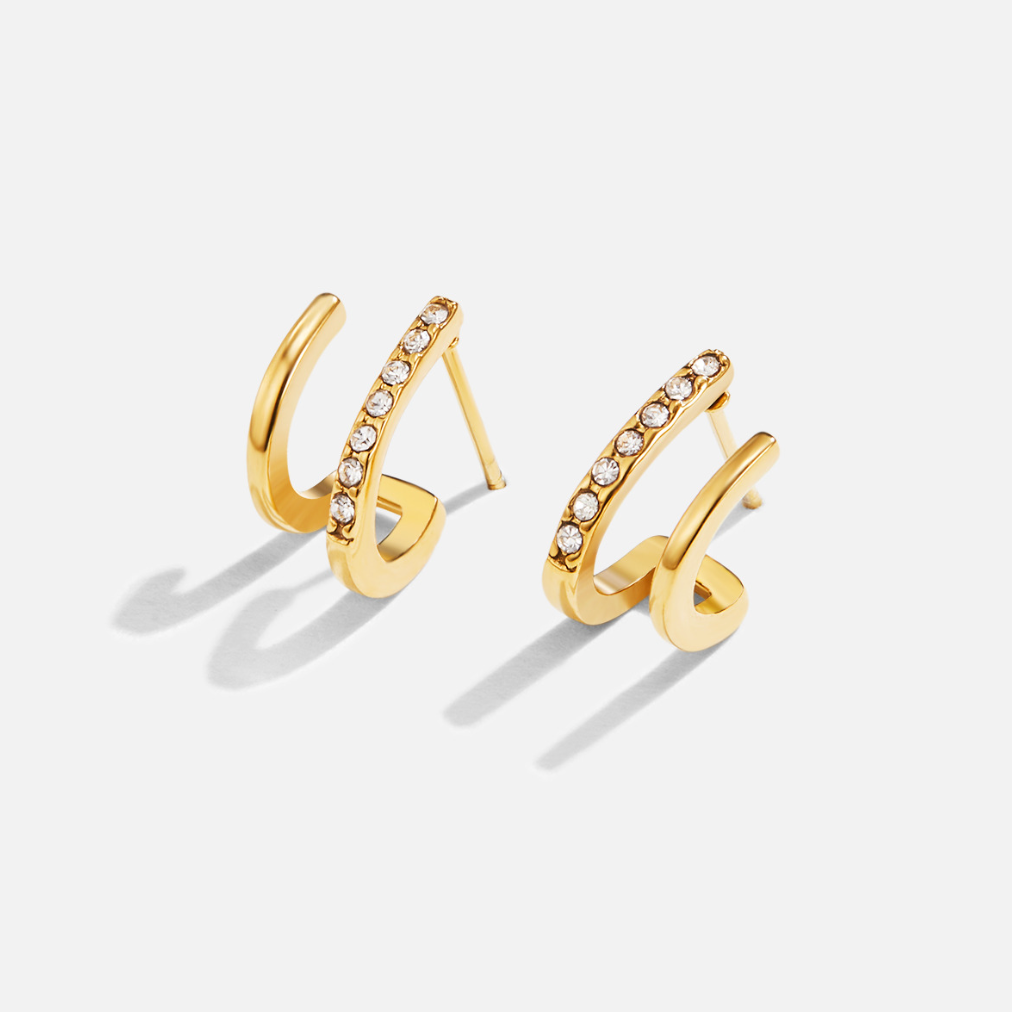 Pendientes de garra de oro y cristal