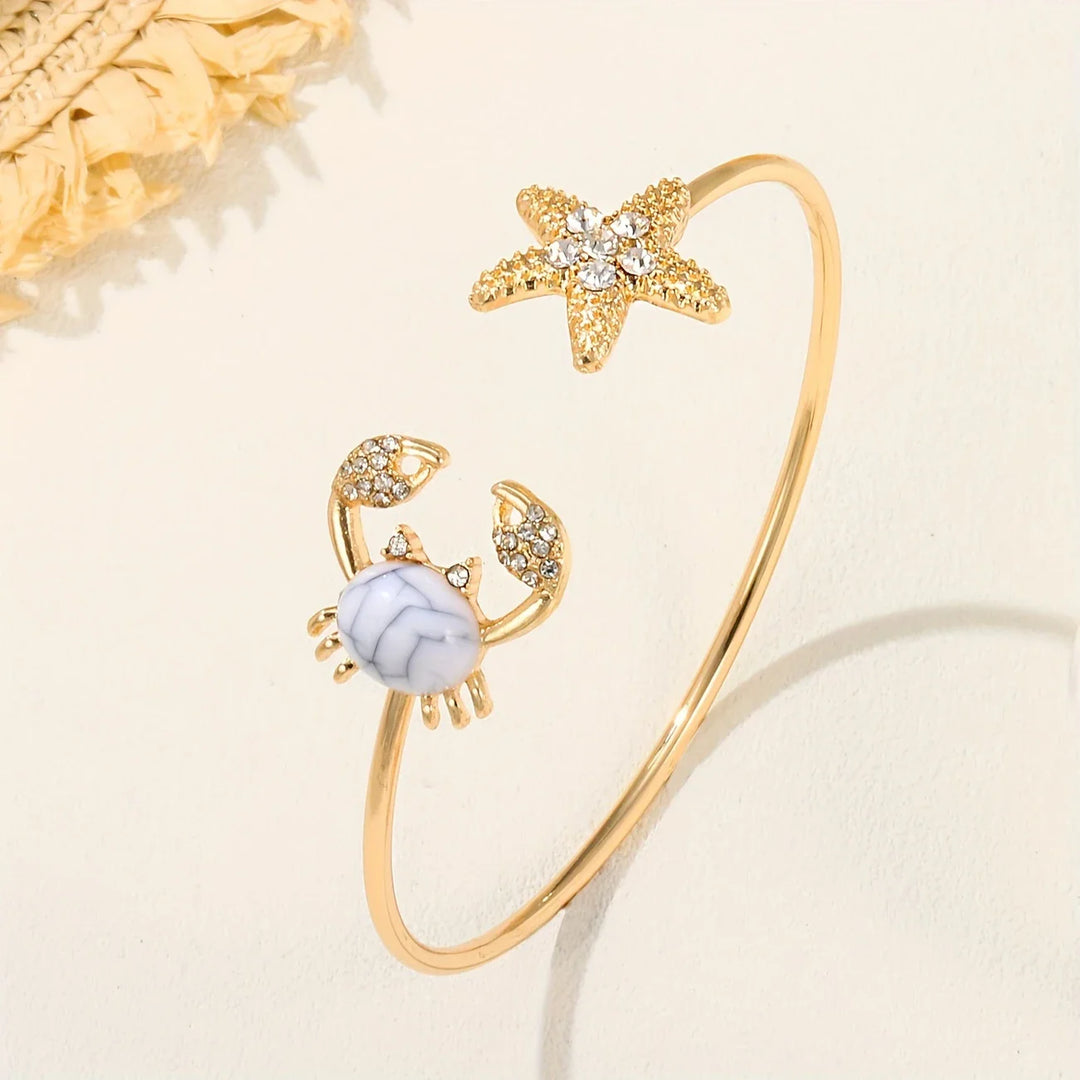Anillo Dorado de Cancrejo Ajustable con Perla Incrustada