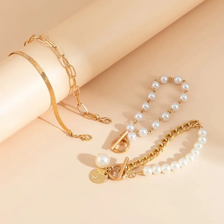 Set de Pulseras Chic Gold 4 Piezas - Serpiente, Perlas y Eslabones | Dorado