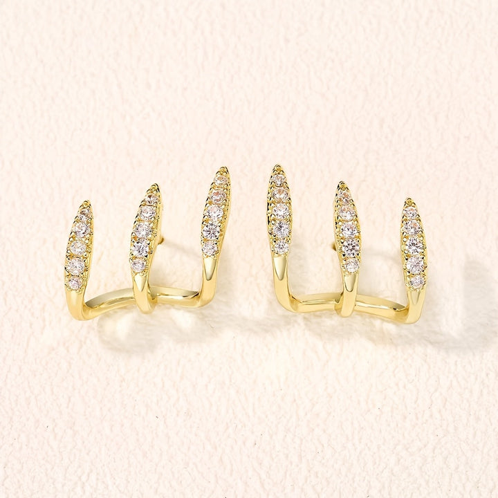 Pendientes de botón elegantes de strass con tres garras