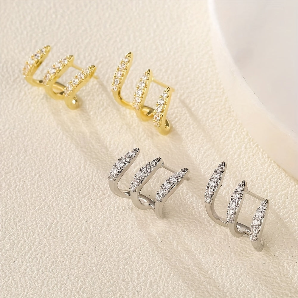 Pendientes de botón elegantes de strass con tres garras