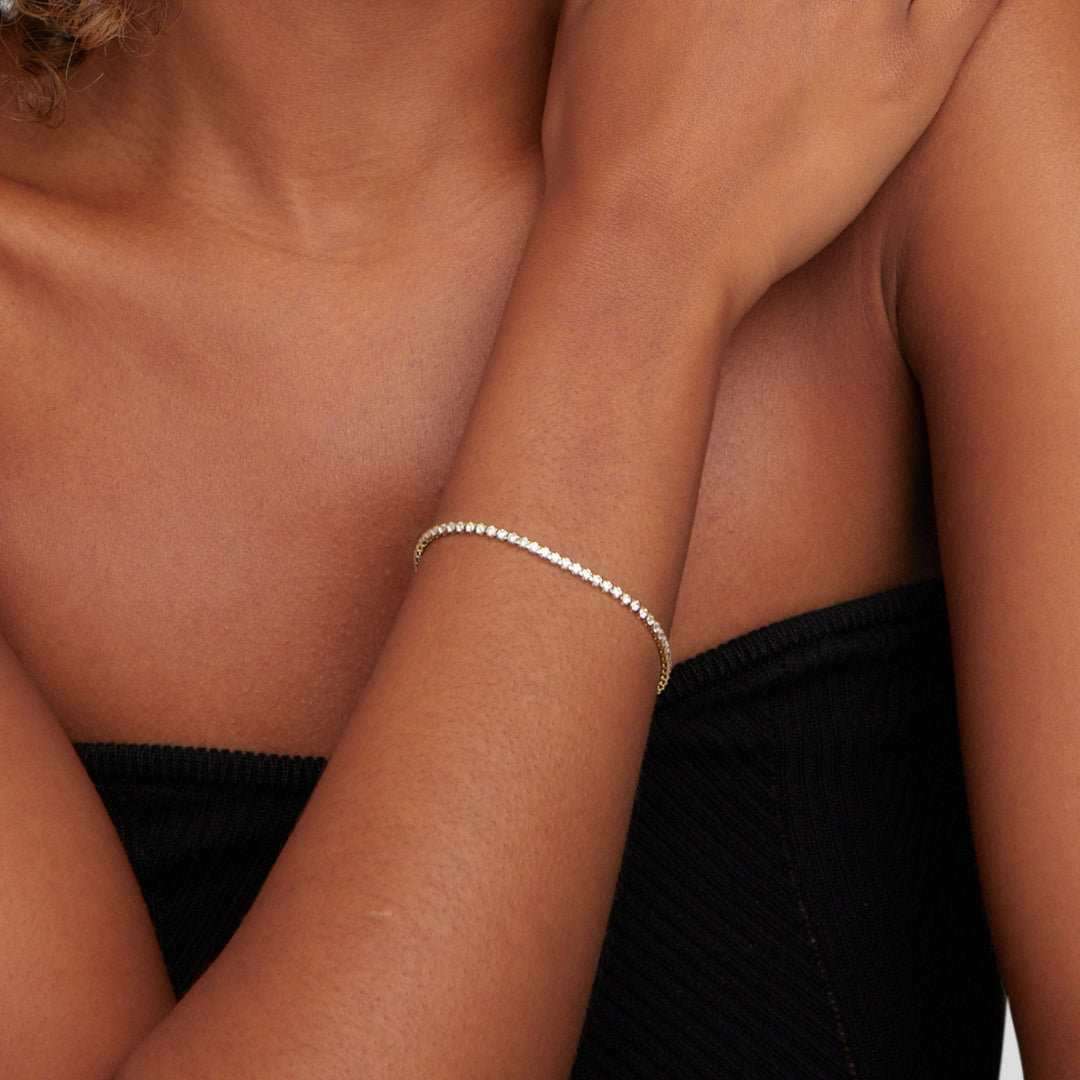 Pulsera de tenis de oro Cordelia