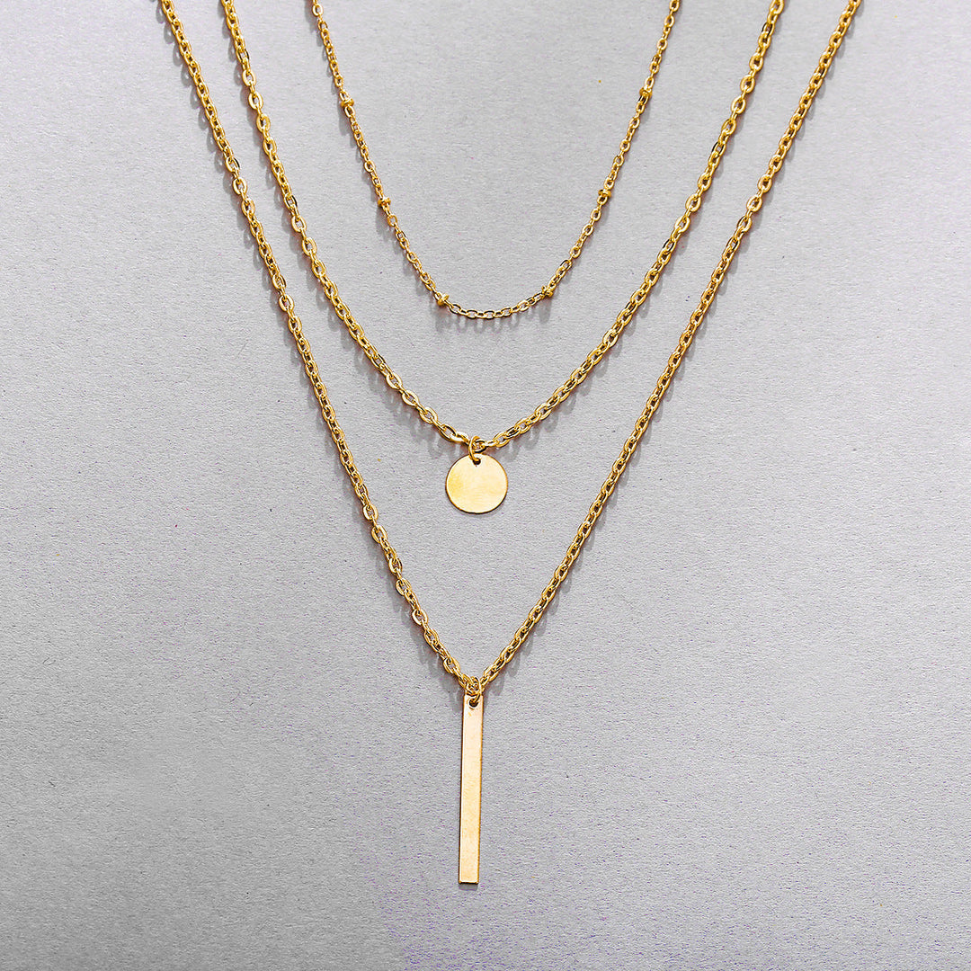 Collar vintage de cadenas superpuestas con colgante geométrico