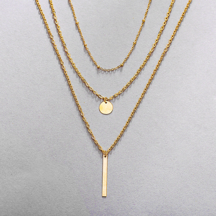 Collar vintage de cadenas superpuestas con colgante geométrico