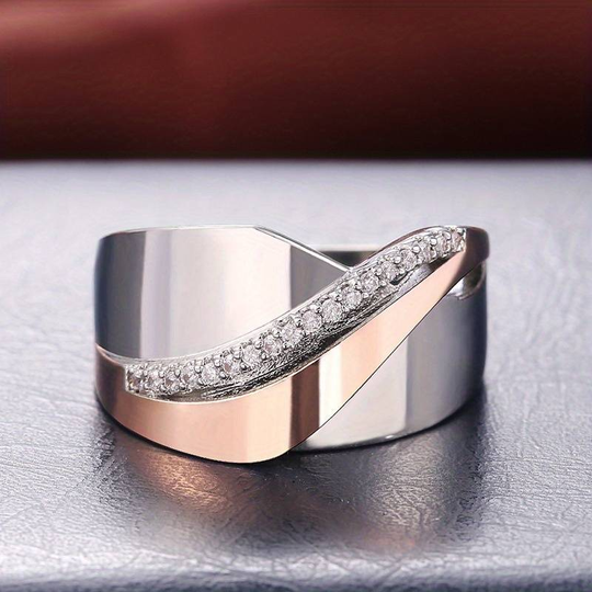 Anillo vintage de oro rosa y plata con circonitas
