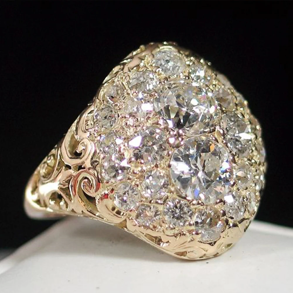 Anillo de oro vintage con diamantes redondos