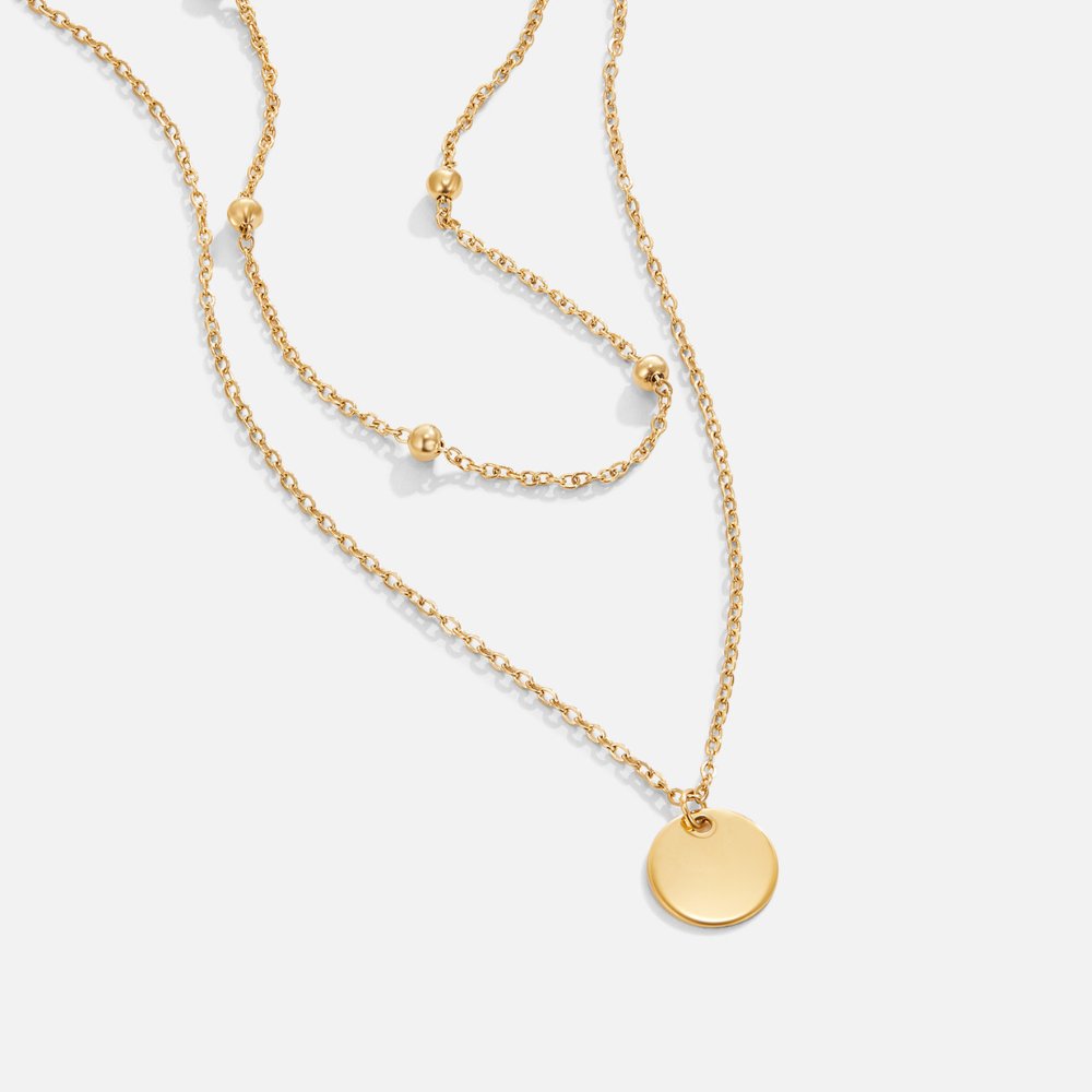 Collar de placas superpuestas