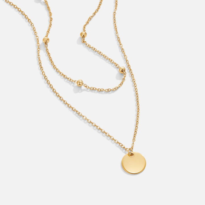 Collar de placas superpuestas